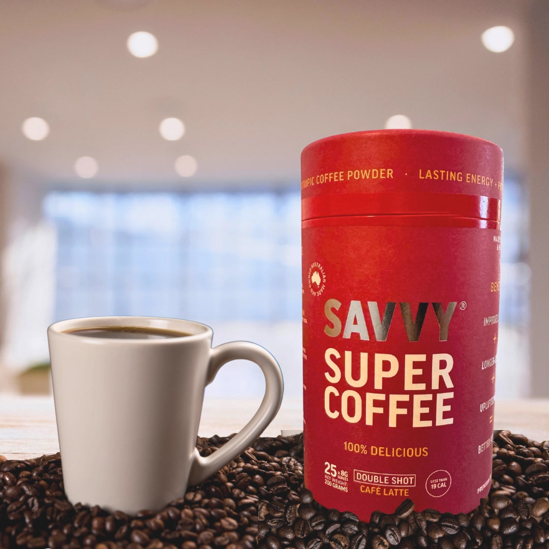 Savvy Super Coffee Cylinder with a coffee mug next to it